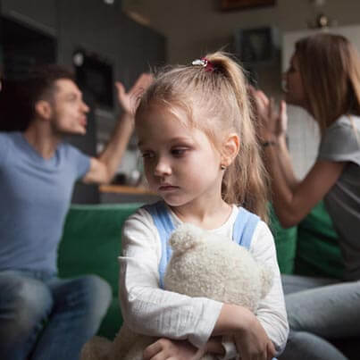 Parents Arguing In Front Of Daughter