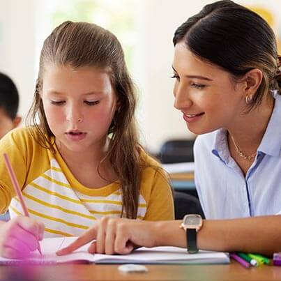 Teacher Helping Student