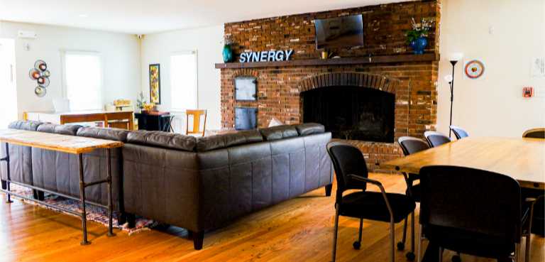 Synergy locations Lounge With Fireplace