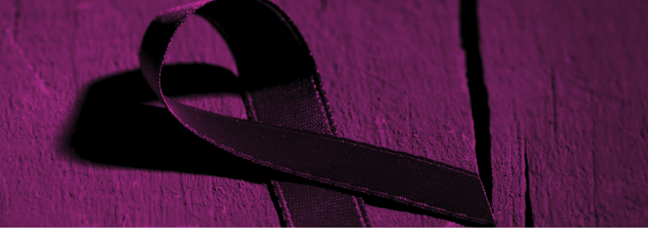 Purple ribbon image to symbolize domestic violence awareness month